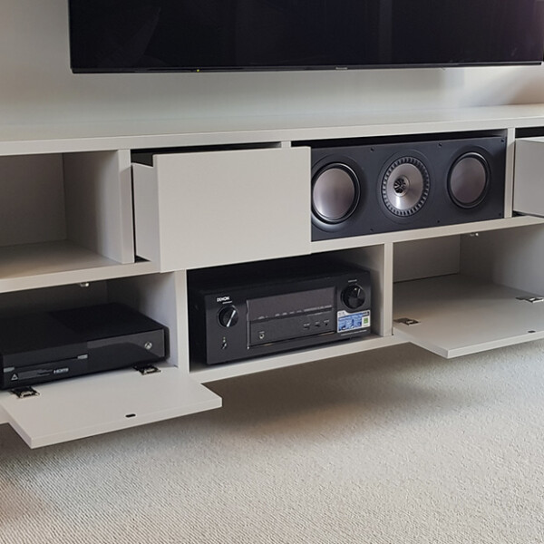 white_tv_unit_with_drawers_and_shelves